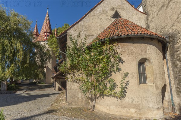Lindau on Lake Constance, colourful thieves' tower, Romanesque St. Peter's Church, apse, exterior view, tree, Bavaria, Germany, Europe