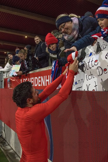 Football match, Marnon BUSCH 1.FC Heidenheim after the match Donation of the jersey to a fan, Voith-Arena football stadium, Heidenheim