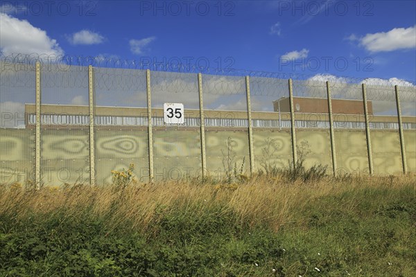 Perimeter fence at Warren Hill prison, Hollesley, Suffolk, England, UK