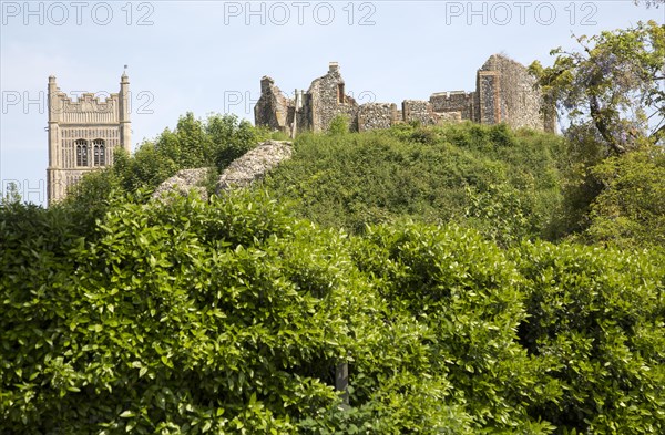 Norman motte and bailey castle with Victorian building ruin Eye, Suffolk, England, UK