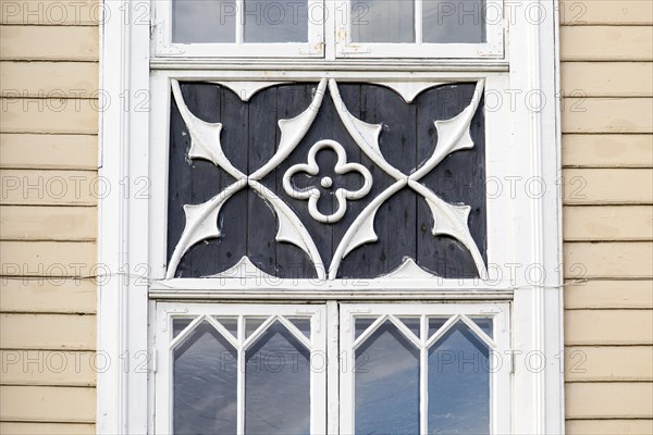 Detail of wood windows, historic wooden cathedral church in city centre, Tromso, Norway, Europe