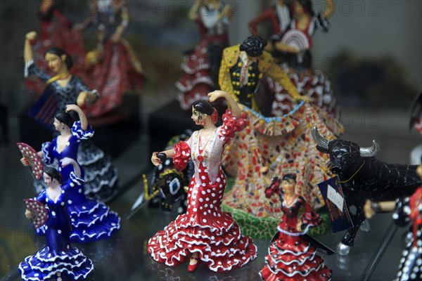 Souvenir gift model figures in shop window display, Benidorm, Spain flamenco dancers bull fighting, matador