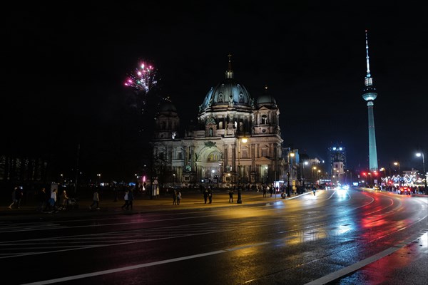 Fireworks in the night as New Year approaches over the Berlin Dome. Berlin, Germany, Europe