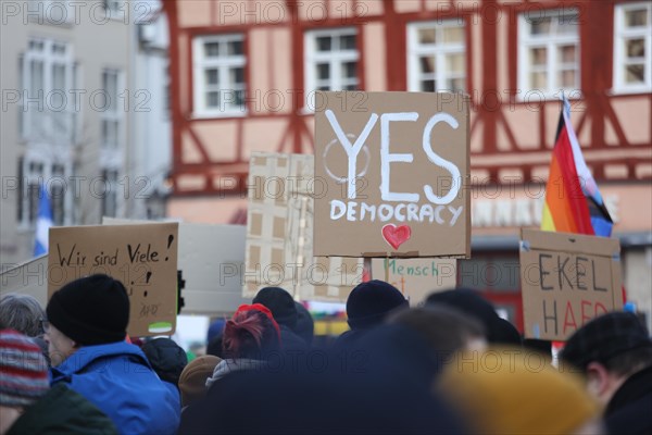 A Yes Democracy placard held high by a member of the crowd during a demonstration against the AFD last Sunday. Coburg, Germany, Europe