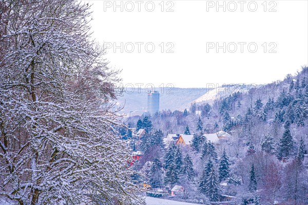 View of the snow-covered Jentower in Jena with mountains and forests in the background, Jena, Thuringia, Germany, Europe