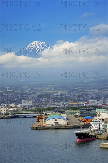 View over the city Fuji and Tagonoura Port with Mount Fuji in the background in spring, Shizuoka Prefecture, Japan, Asia