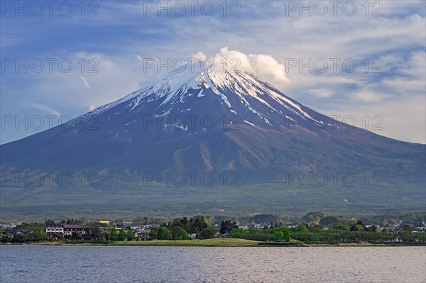 Mount Fuji in spring, active stratovolcano showing volcanic cone seen from across Lake Shji on Japanese island Honsh, Yamanashi Prefecture, Japan, Asia