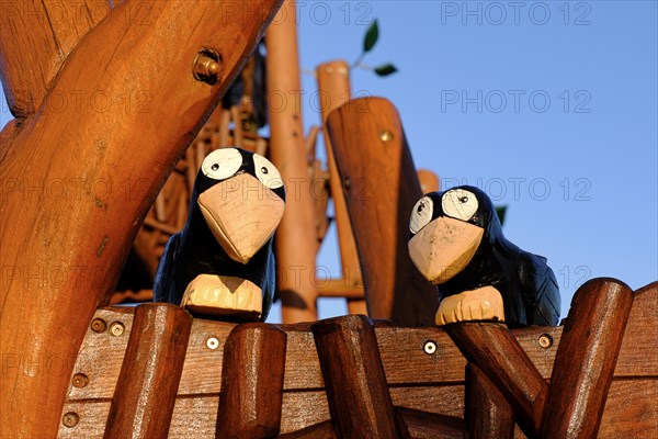 Wooden figure of two ravens, North Rhine-Westphalia, Germany, Europe