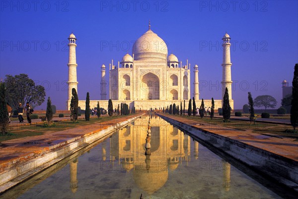 Classic early-morning view of the Taj Mahal reflecting in still water, Agra, India, Asia