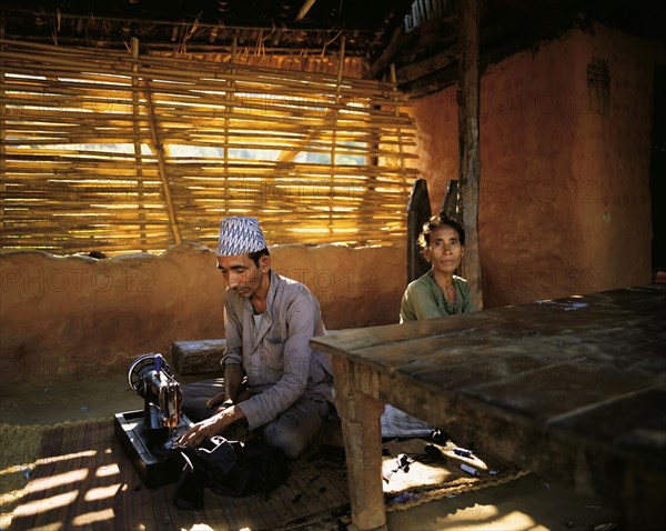 The village tailor and his wife in the village of Sultibari in east Nepal