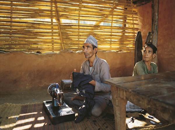 The village tailor and his wife in the village of Sultibari in east Nepal