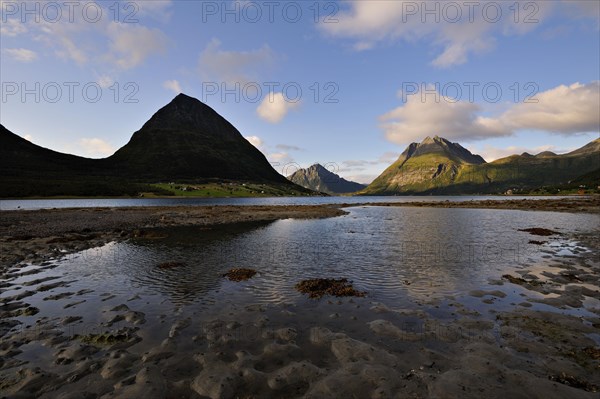 The island of Aldra with the Hjartinden peaks from the shore at Haugland, north-west Norway