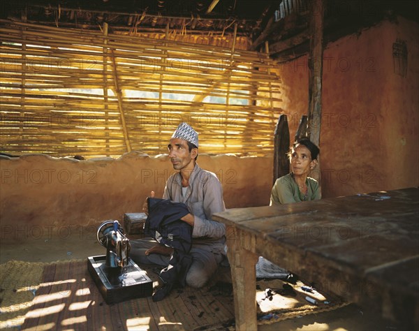 The village tailor and his wife in the village of Sultibari in east Nepal