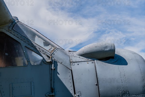 Air intake on top of radial engine cowling of antique airplane on display in public park