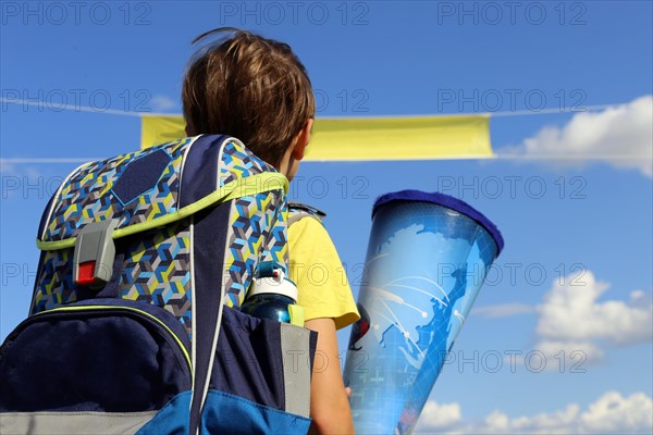 Child on the way to his first day of school, (Mutterstadt, Rhineland-Palatinate)