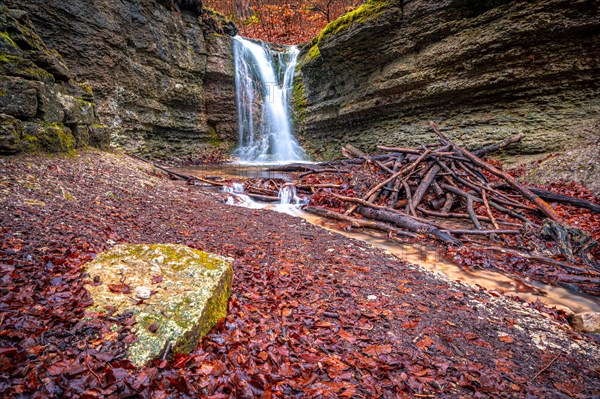 The waterfall in the Rautal forest at Burschenplatz in winter, Jena, Thuringia, Germany, Europe