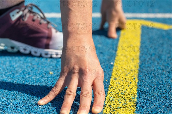 Close-up of an athlete in front of the start of a race (symbolic image)