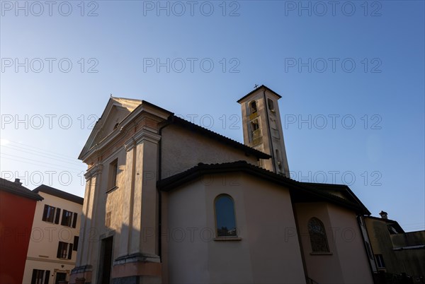 Old Church of Sant'Andrea From Year 1208 with Sunlight and Blue Clear Sky in Agnuzzo, Ticino, Switzerland, Europe