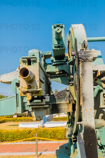 Rear view of two of four machine guns on military quadmount turret on display in public park