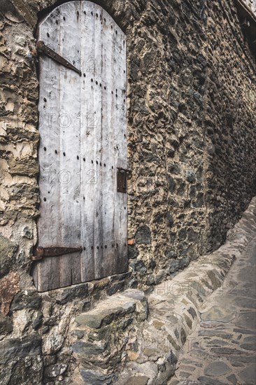 Door detail in Rupit, one of the best known medieval towns in Catalonia in Spain
