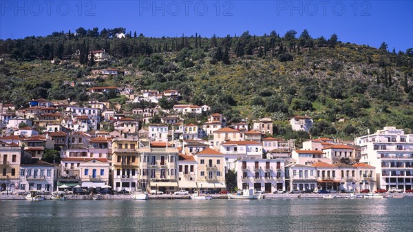 View of a coastal town with traditional architecture along the sea, Gythio, Mani, Peloponnese, Greece, Europe