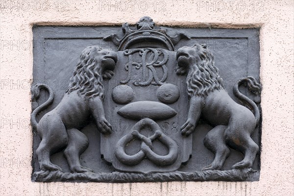 Relief of an old baker's sign on a former bakery, Bavaria, Germany, Europe