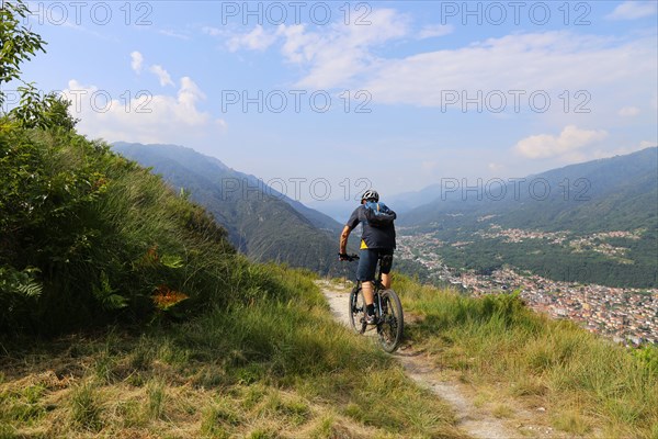 Mountain bikers on a trail in Val Grande near Lake Maggiore