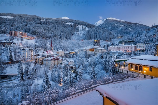 Deep snowy winter panorama of the village at dusk, Bad Gastein, Gastein Valley, Hohe Tauern National Park, Salzburg Province, Austria, Europe