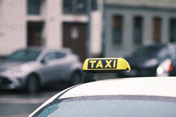 Taxi sign with blurred background, Duesseldorf, Germany, Europe