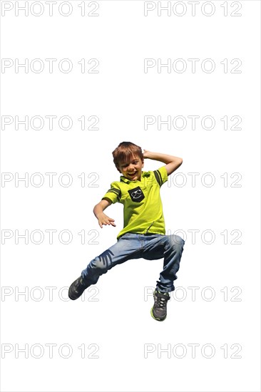 Symbolic image: Boy jumping into the air (white background)