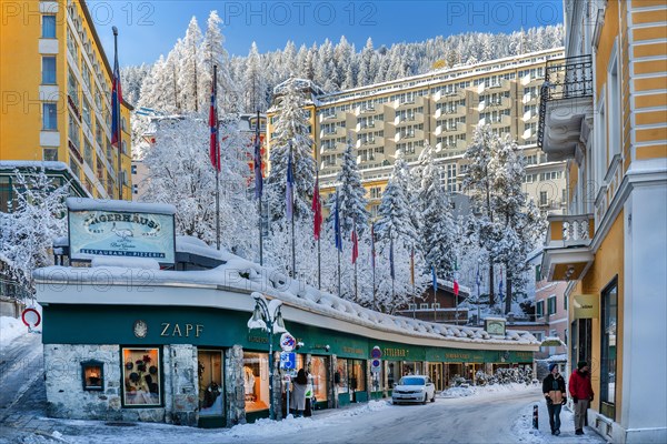 Winter main street in the town centre with shops and hotels, Bad Gastein, Gastein Valley, Hohe Tauern National Park, Salzburg province, Austria, Europe