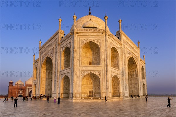 The majestic Taj Mahal during sunset with visitors in the foreground, Taj Mahal, Agra, India, Asia