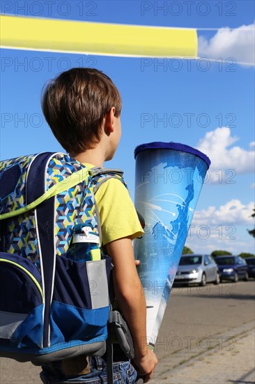 Child on the way to his first day of school, (Mutterstadt, Rhineland-Palatinate)