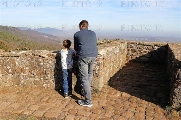 Father and son enjoy the view from Madenburg Castle, Palatinate