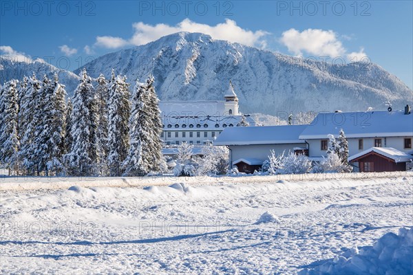 Winter landscape with Schlehdorf Monastery in front of the Jochberg 1567m, Schlehdorf, Lake Kochel, The Blue Country, Bavarian Alps, Upper Bavaria, Bavaria, Germany, Europe