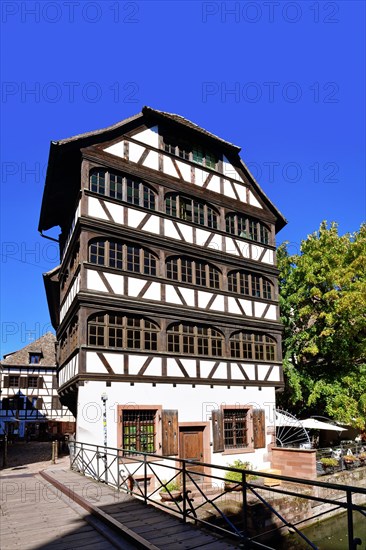 Strasbourg, France, September 2023: Traditional European style half timbered frame house at River 'III' in historical city center, Europe