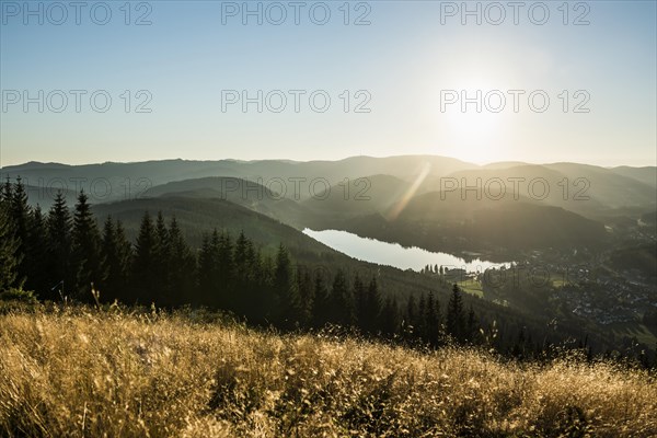 View from Hochfirst to Titisee and Feldberg, sunset, near Neustadt, Black Forest, Baden-Wuerttemberg, Germany, Europe