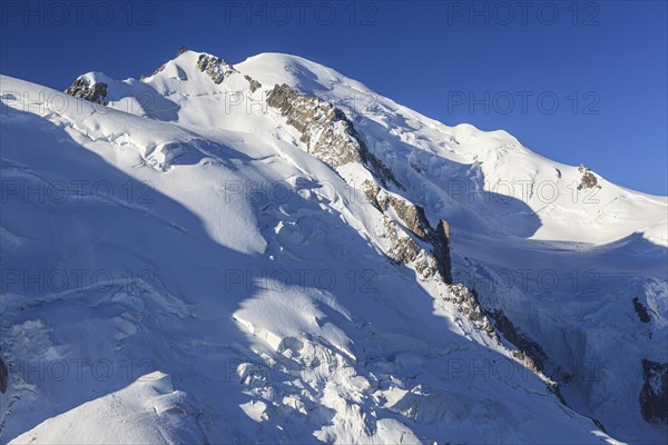 Mountain peak with glacier at sunrise, Mont Blanc, Mont Blanc Massif, French Alps, Chamonix, France, Europe