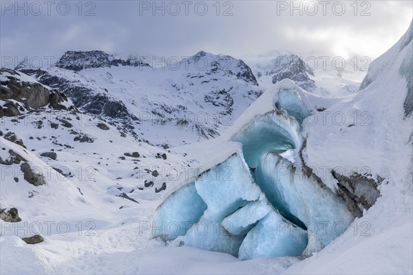 Glacier tongue in front of a mountain peak, snow, winter, Morteratsch glacier, Pontresina, Engadin, Grisons, Switzerland, Europe