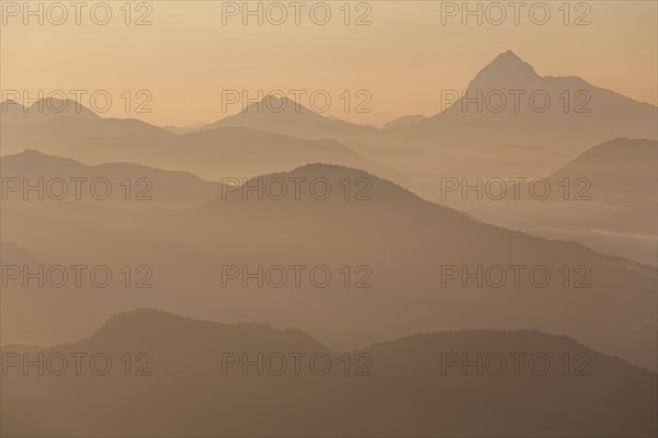 Mountain peak in the haze, sunrise, summer, view from Jochberg to Guffert and Bavarian Alps, Upper Bavaria, Bavaria, Germany, Europe
