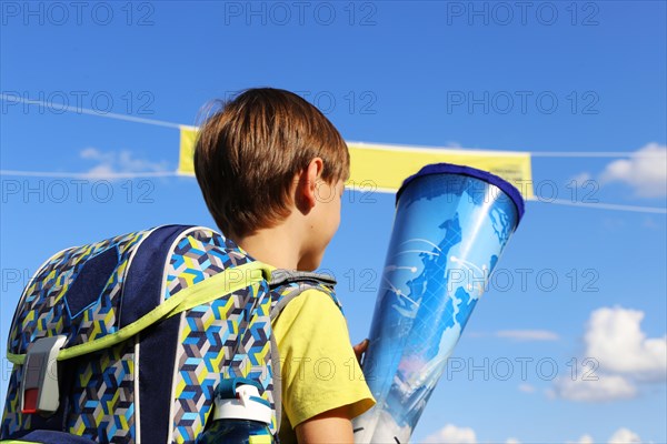 Child on the way to his first day of school, (Mutterstadt, Rhineland-Palatinate)