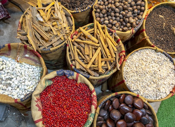 A bird's-eye view of sacks with various colorful spices and herbs for sale at a market in Fort Kochi, Cochin, Kerala, India, Asia