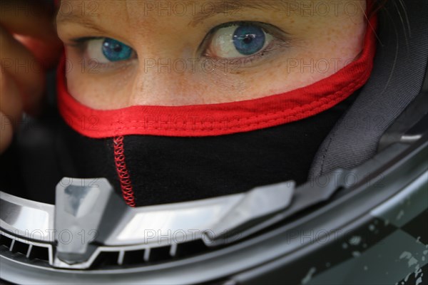 Racer with helmet and balaclava