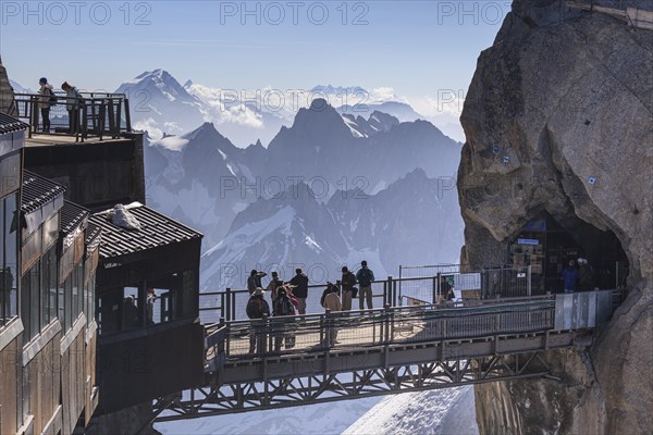 Tourists on viewing platform in front of mountains, mountain station, Aiguille du Midi, Mont Blanc massif, Chamonix, French Alps, France, Europe