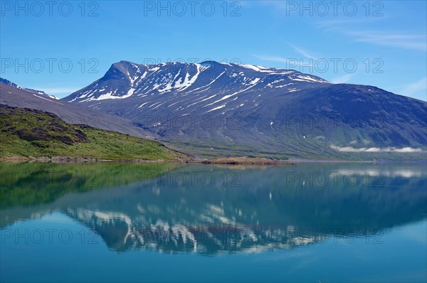Mountains reflected in a fjord in a barren landscape, Igaliku, North America, Greenland, Denmark, North America