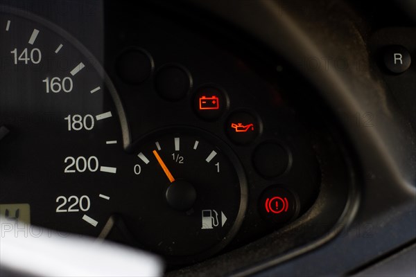 Screen display of car status warning light on dashboard panel symbols which show the fault indicators. low battery, lack of oil