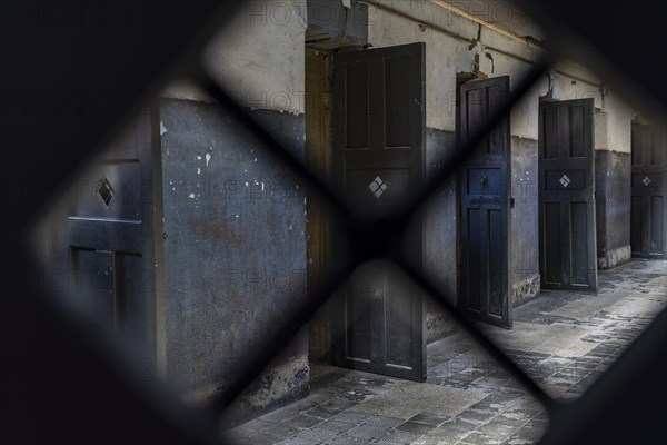 View through a grille of the wing with prisoners' cells in the former Presidio prison, Presidio Museum and Maritime Museum, Ushuaia, Tierra del Fuego Island, Patagonia, Argentina, South America