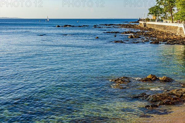 Seafront of the city of Salvador in Bahia in the Porto da Barra neighborhood in a sunny summer day, Salvador, Bahia, Brasil