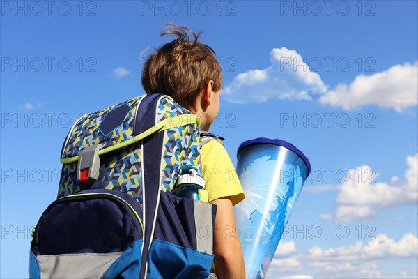 Child on the way to his first day of school, (Mutterstadt, Rhineland-Palatinate)