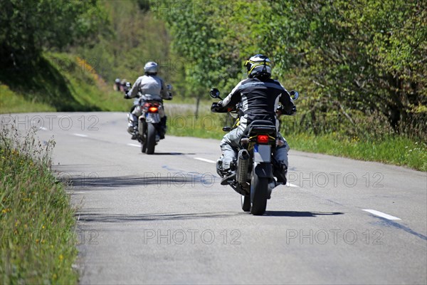 Motorcyclists photographed from behind, here in the Grand Ballon area in the Vosges, a popular destination for tourists and day trippers from Germany too